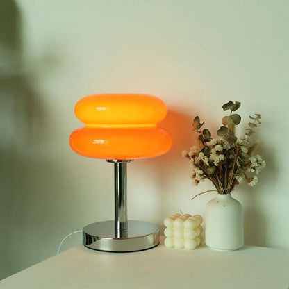 lampe macaron orange allumée