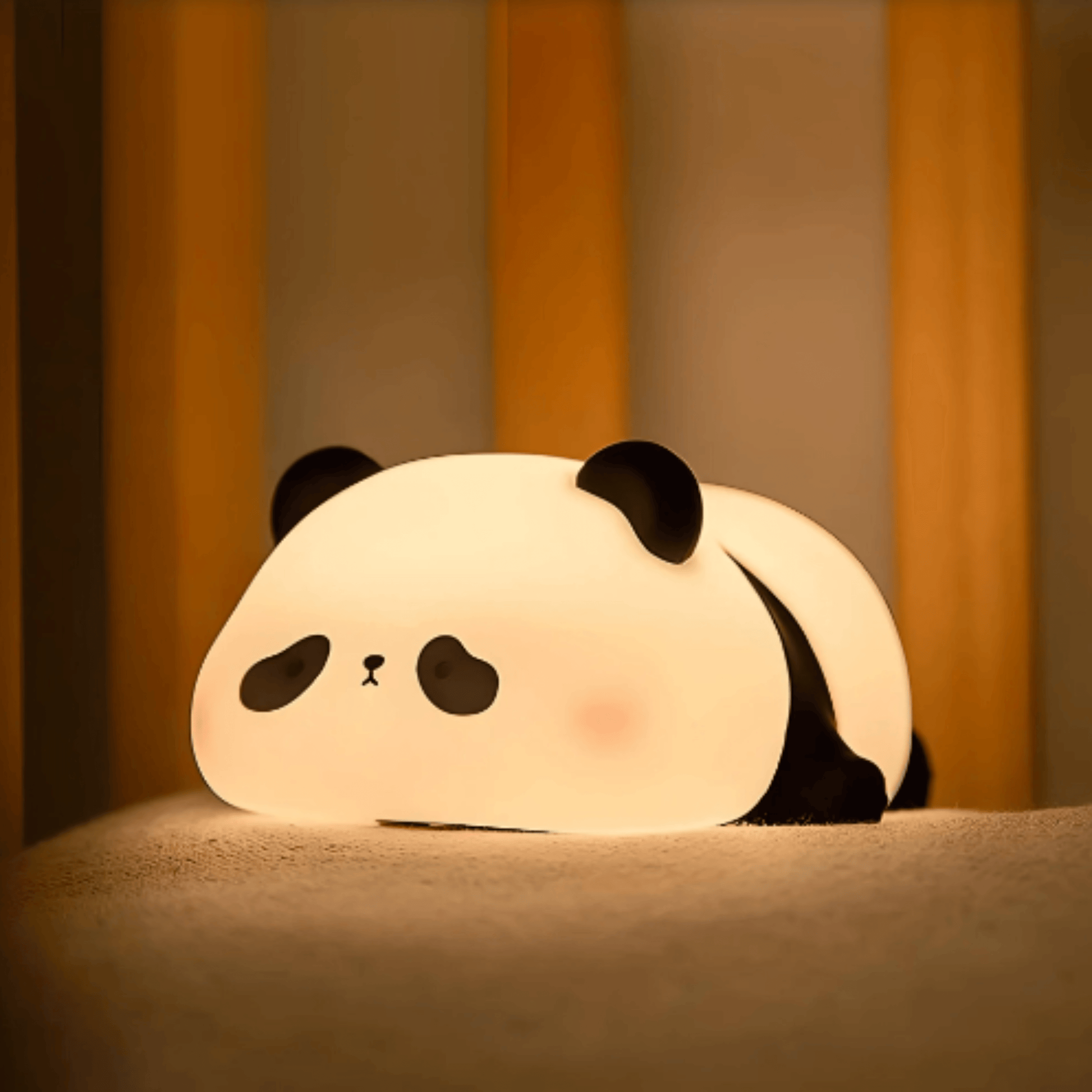 veilleuse panda allongé allumée 